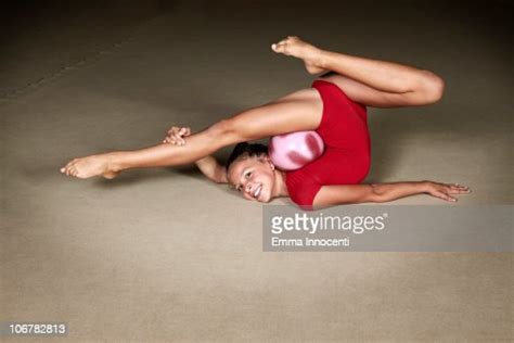 Gymnastic Bending Over Backwards Smile Ball Photo Getty Images
