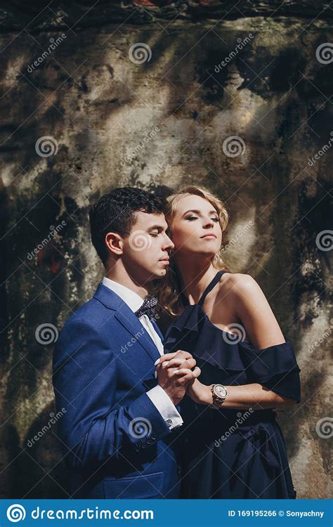 Stylish Couple Embracing In Sunny Light In European City Street Tender Romantic Moment