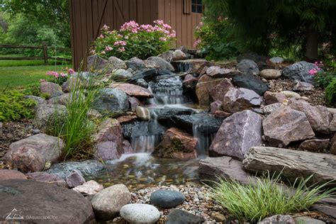 He leans forward and lays out the following process Pondless Waterfall Design & Construction Tips for Beginners
