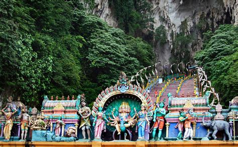 Batu caves, kuala lumpur is famous for the giant statue of lord kartikeya situated at the entrance and the limestone caves. Batu Caves. Kuala Lumpur, Malaysia. | Batu Caves is a ...