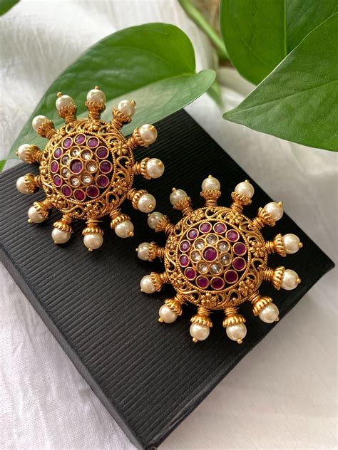 Suryakanti Circle Ruby And White Stones Stud Earrings Statement Jhumka