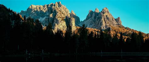 Download Wallpaper 2560x1080 Mountain Lake Sky Shadows Reflection