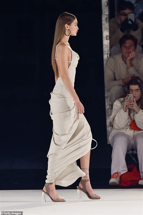 Gigi Hadid Flaunts Her Endless Pins In A Slinky Gown On The Runway Of The Jacquemus Pfw Show