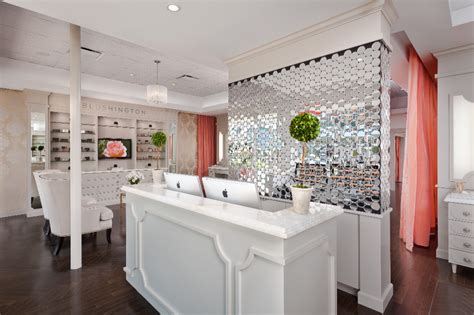 A Large White Counter In A Room With Lots Of Furniture And Decor On The