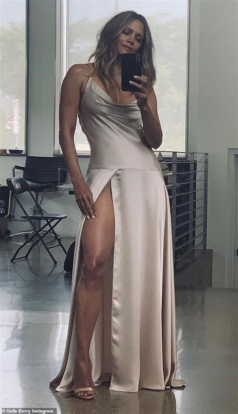 Halle Berry In Dress With A Slit So High Up Her Leg It Looks As If She Is Not Wearing