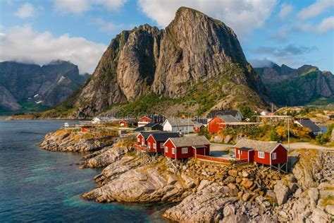 View Of The Red Cottages By The Coastline In Hamnøy Lofoten Islands