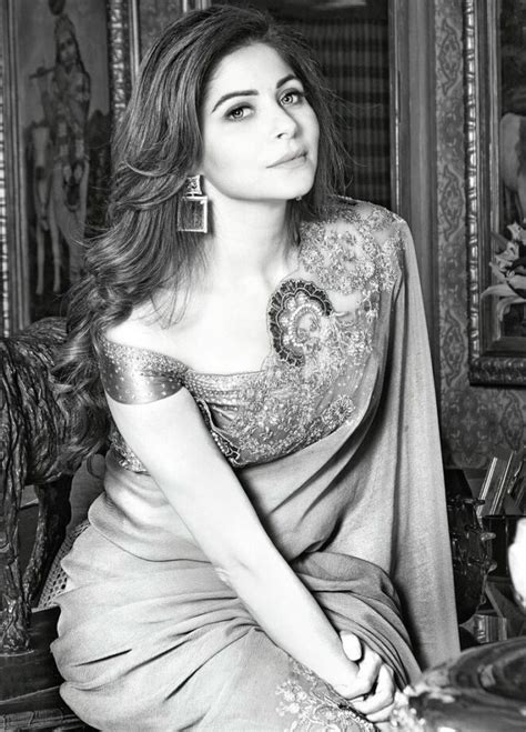 Bollywood Singer Kanika Kapoor Looks Glamorous In Sequin Black Saree With Cape Sleeves See