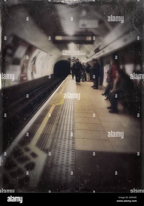 Waiting For A Tube Train On The Platform At Kings Cross Station On The