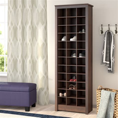 Made of solid wood and sturdy construction, this shoe cabinet is equipped with three compartments on each of the fo…. Three Posts Kahl 36 Pair Shoe Rack & Reviews | Wayfair.ca