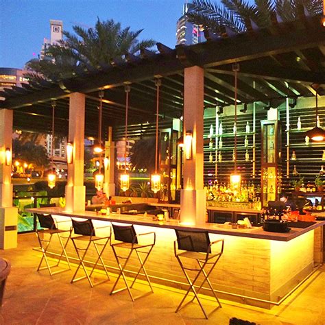 Outdoor lights and small decorative accents, such as shells, help to reinforce the design aesthetic. 6 Inspirational Outdoor Kitchen Bar Ideas