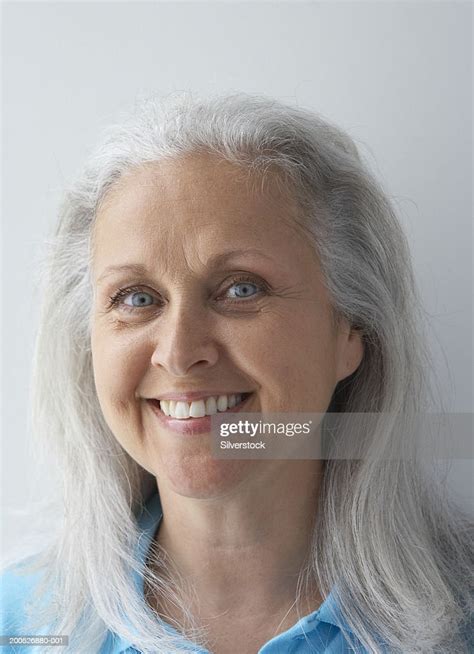 Mature Woman Smiling Closeup Portrait High Res Stock Photo Getty Images