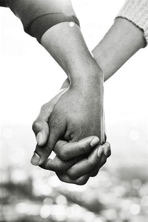 Closeup Of Couple Holding Hands Outside Black And White Photo By