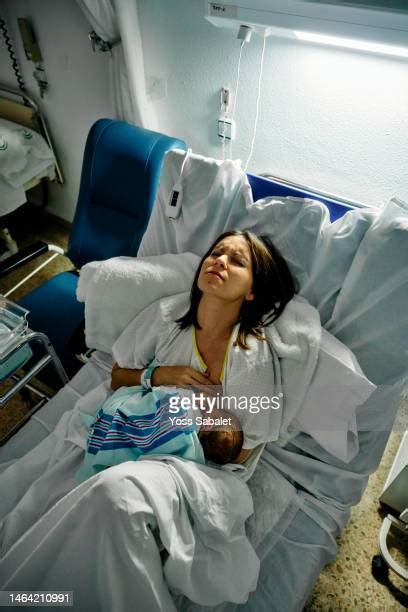 Breastfeed Pain Photos And Premium High Res Pictures Getty Images