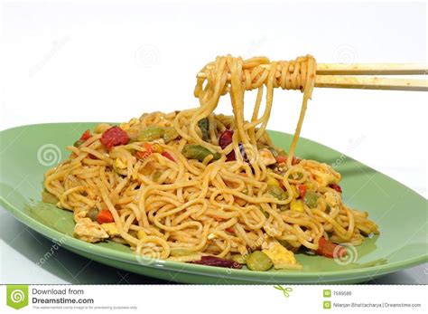 Fried sauce noodles in beijing. Eating Noodles With Chopsticks Stock Photo - Image of ...