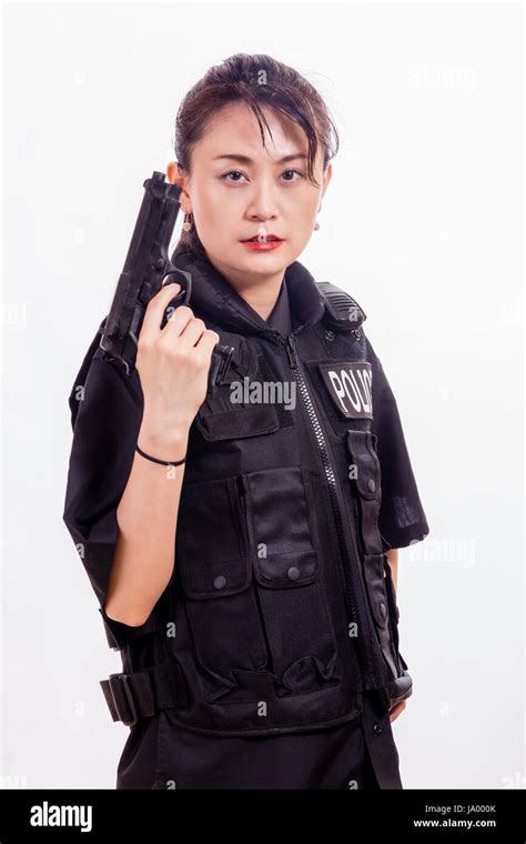 Chinese Female Police Officer With Handgun Stock Photo Alamy