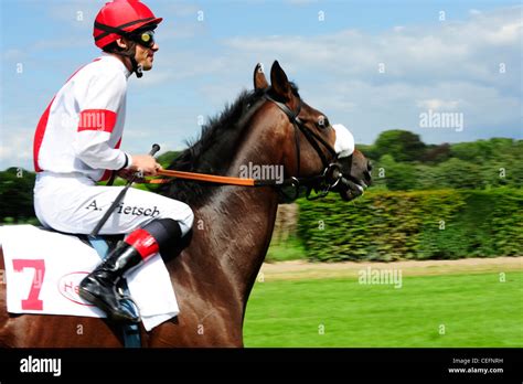 Jockey On Racehorse Stock Photo Alamy