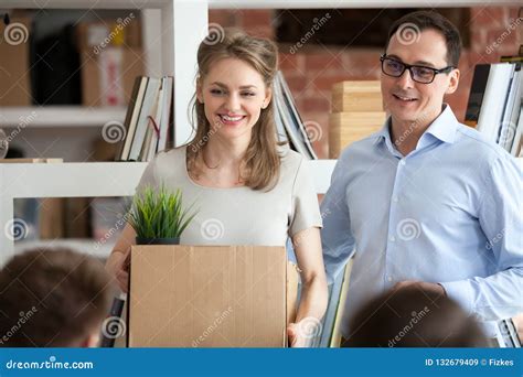 Team Leader Introducing New Hired Female Employee To Colleagues Stock