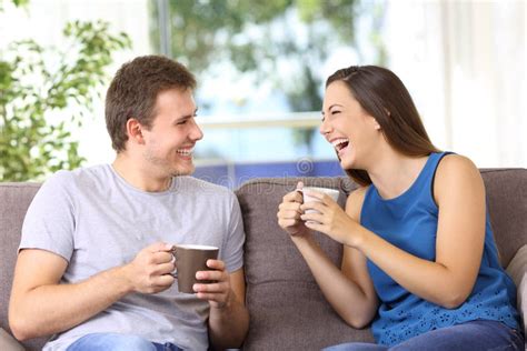 Two People Talking And Laughing At Home Stock Image Image Of Couple