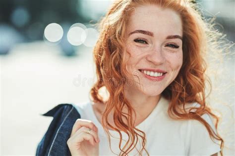 Beautiful Red Haired Girl Having Fun On The Street The Girls Have A