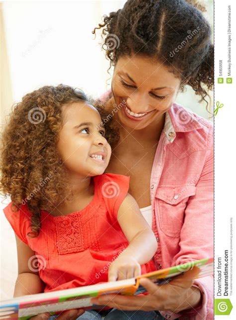 Mixed Race Woman And Daughter Reading Stock Photo Image Of Race