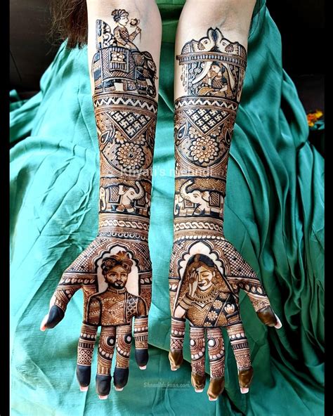 Two Hands With Henna Designs On Them One Is Holding An Elephant And