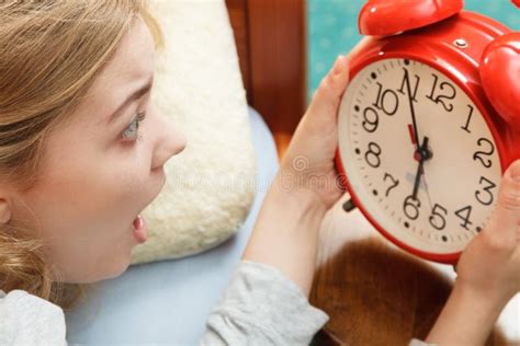 Woman Waking Up Late Turning Off Alarm Clock Stock Photo Image Of