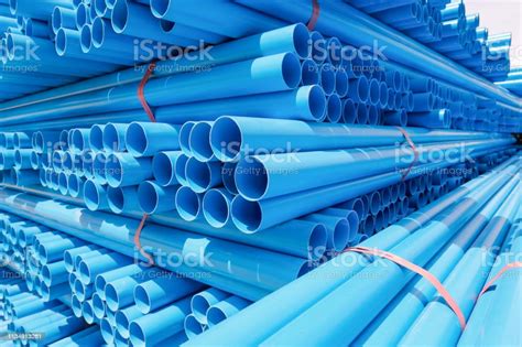 Pvc Pipe Stacked In Warehouse Stock Photo Download Image Now Blue