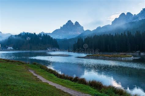 Romantic Sunrise Over A Mountain Lake In The Italian Alps Stock Photo