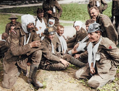 Wounded British Troops Wearing German Helmets Outside A Casualty