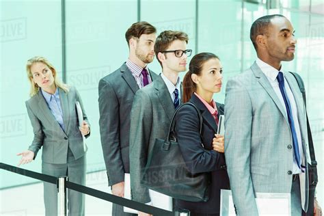 Business People Waiting In Line Stock Photo Dissolve