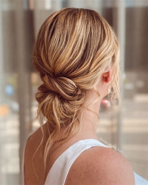 40 Beautiful Updo Hairstyles For 2022 Effortless Blonde Messy Knot