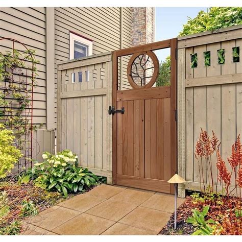 35 Ft W X 6 Ft H Cedar Fence Gate With Round Metal Art Insert 201568