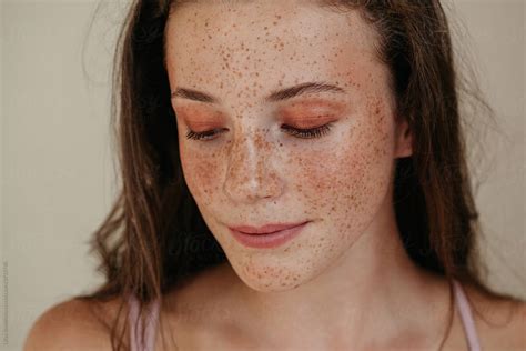 crop face natural beauty portrait of girl with freckles by liliya rodnikova