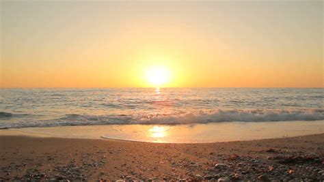 Sunset On The Beach Tranquil Idyllic Scene Of A Golden