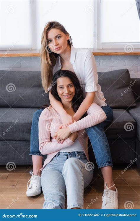 Happy Blonde And Brunette Lesbians Hugging Stock Image Image Of Home Emotion 216551487