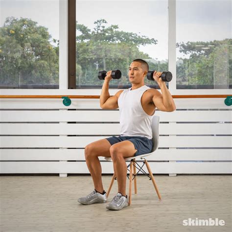 Seated Dumbbell Press Exercise How To Workout Trainer By Skimble