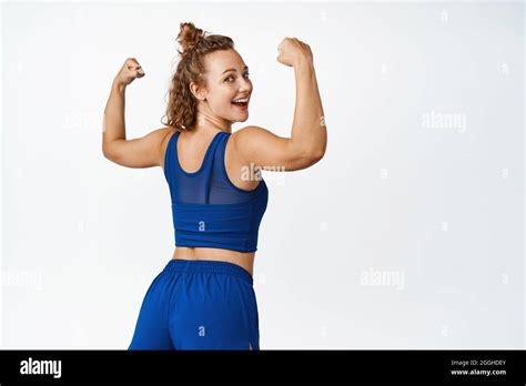 Female Athlete Flexing Her Biceps Hi Res Stock Photography And Images
