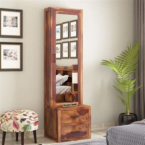 Adresseris a dressing table that has chest of drawers as the base and usually a mirror on the top. Buy Aberdeen Dressing Table (Teak Finish) Online in India - Wooden Street