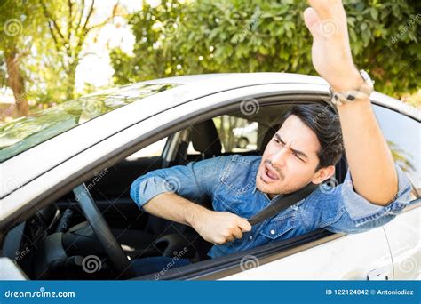 Annoyed Driver Arguing And Gesturing On Road Stock Photo Image Of