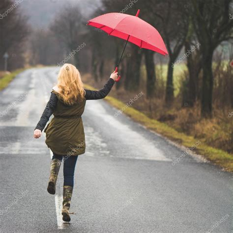 Woman With Umbrella — Stock Photo © Loriklaszlo 53963489