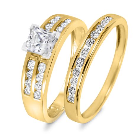 The engagement ring features a round diamond haloed in additional round diamonds. 1 1/2 CT. T.W. Diamond Women's Bridal Wedding Ring Set 10K ...