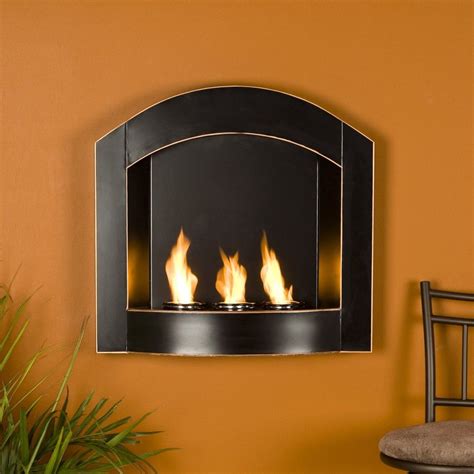 The dark tone will easily match your decor. Real Flame White Envision Wall Ventless Fireplace indoor | Fireplace wall, Indoor gas fireplace ...