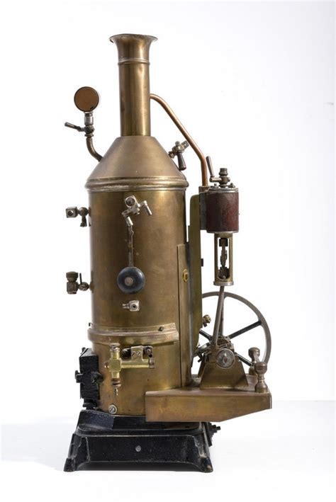 An Early Vertical Steam Engine Measuring 44 Cm In Height 14 Cm The