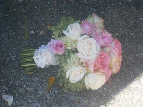 Esperance roses, blushing akito, green hydrangeas,vendela roses, queen anna lace, with her ...