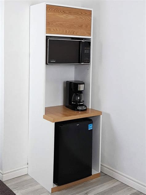 Make an adorable play kitchen with sink, stove, oven, fridge and microwave from an old pair of nightstands with a great tutorial from i briefly considered turning it into something else besides a kitchen addition but about that time o realized he was strong enough to actually open the real fridge. Multi functional cupboard, Mini Fridge Microwave Cabinet ...