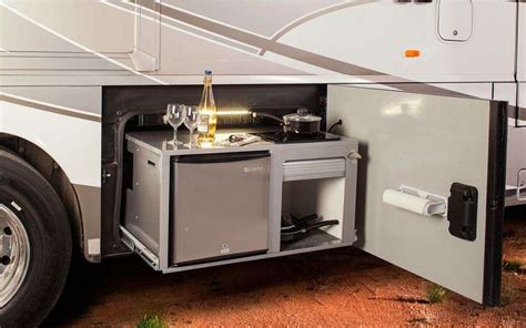 On the door side end is a dometic cooler drawer. 10 Amazing RVs Outdoor Entertaining & Kitchens
