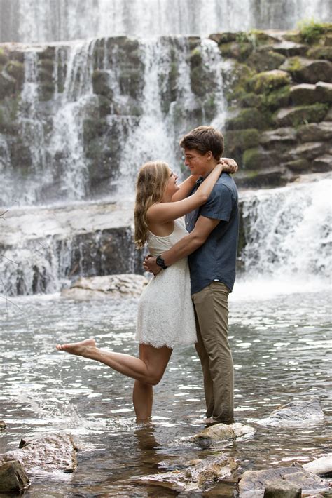 Engagement Shoot In Front Of Waterfall Couple Photoshoot Poses