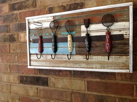 Common kitchen tasks include cutting food items to size, heating food on an open fire or on a stove, baking, grinding, mixing, blending, and measuring; Kitchen decor images - old wood and antique utensils ...
