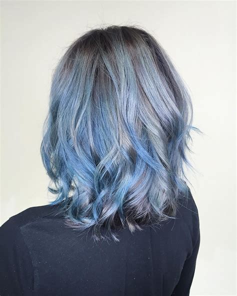 Shoulder length haircuts allow for many styling and coloring options. Shoulder-Length Wavy Hair with Short Layers and Blue ...