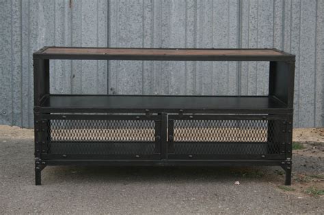 Place your tv on the top of your stainless steel stand and either leave it as the sole focal point or place small decorative pieces to the sides. Industrial TV Stand - Combine 9 | Industrial Furniture